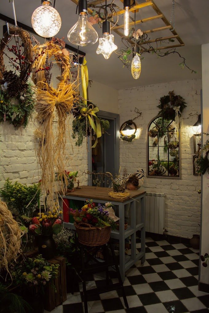 Chez Gizza interior with hanging lights and checkered floor